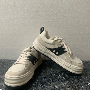 Chic Black and Cream Platform Sneakers